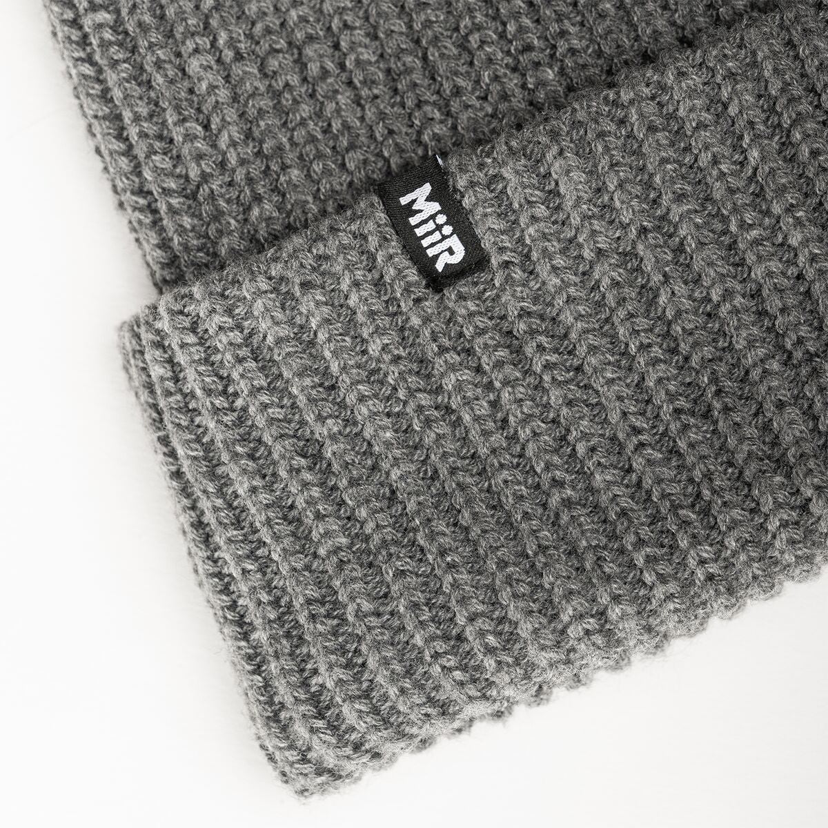 jodie-williams-beanie-s4 WebPDP-RecycledPolyRibBeanie_Studio_TagDetail_GrayHeather__BNE002400OS.jpg
